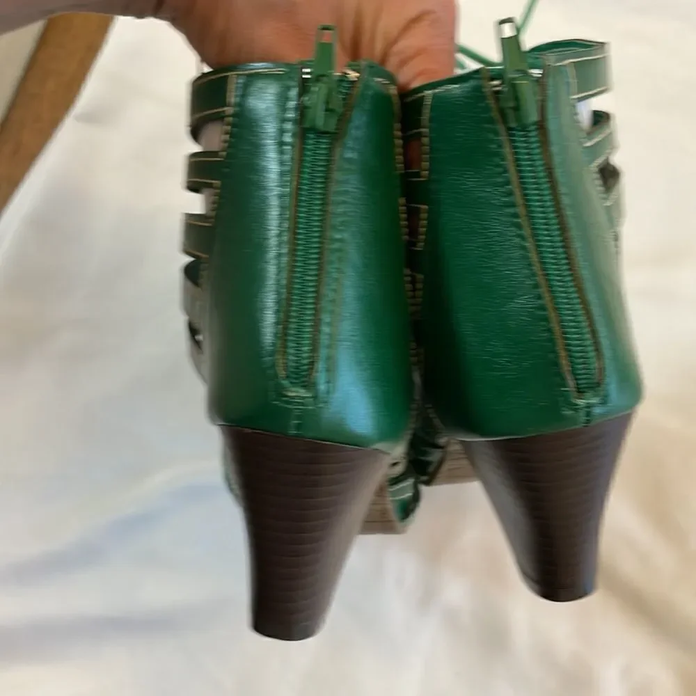 RASOLLI GREEN LACE UP CUT OUT SHOOTIES.  ZIP UP BACK. NEW IN BOX